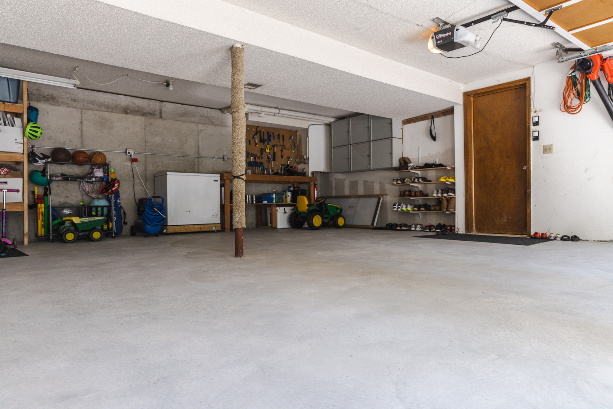 Professional concrete garage floor installation by Edmond Concrete Pros in Oklahoma showing clean finished garage